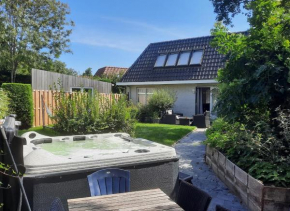 Holiday Home de witte raaf with garden and hottub